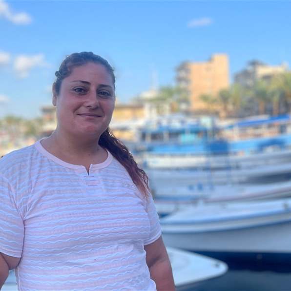 Mary: The Lone Woman Defying the Waves as a Fisher in Tyre&#39;s Harbor -  Cathrin Ibrahim